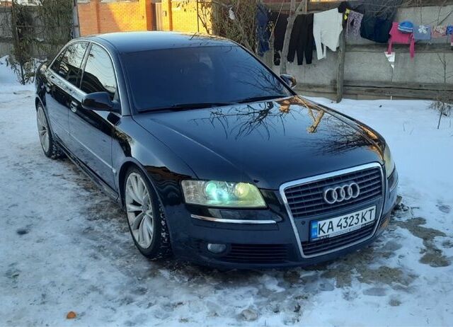 Чорний Ауді A8, об'ємом двигуна 4 л та пробігом 303 тис. км за 7000 $, фото 1 на Automoto.ua