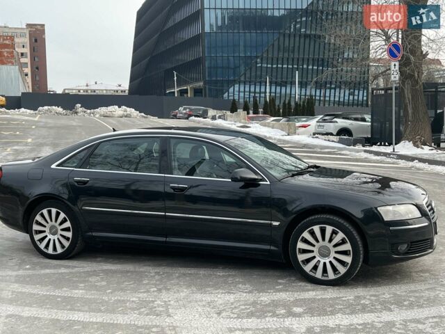 Чорний Ауді A8, об'ємом двигуна 4.2 л та пробігом 542 тис. км за 12000 $, фото 1 на Automoto.ua