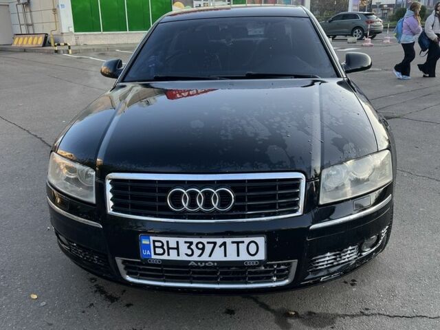 Черный Ауди А8, объемом двигателя 3 л и пробегом 336 тыс. км за 6000 $, фото 1 на Automoto.ua