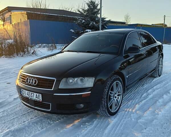 Черный Ауди А8, объемом двигателя 4.2 л и пробегом 320 тыс. км за 7600 $, фото 1 на Automoto.ua