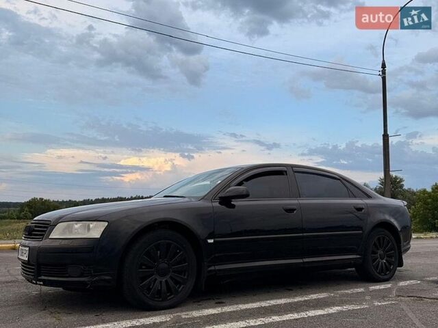 Черный Ауди А8, объемом двигателя 3 л и пробегом 310 тыс. км за 6385 $, фото 1 на Automoto.ua
