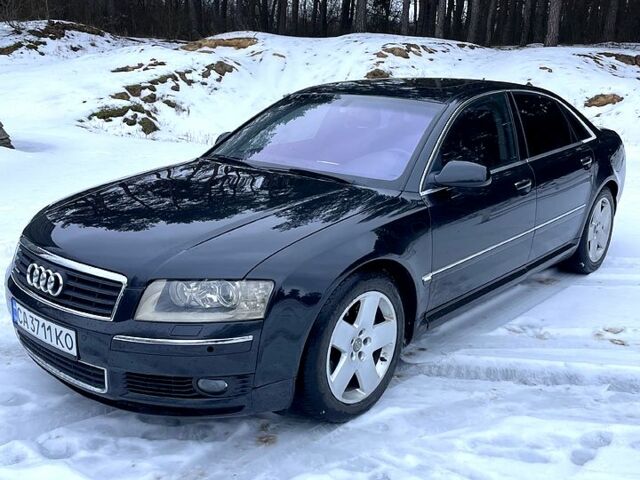 Черный Ауди А8, объемом двигателя 3.9 л и пробегом 330 тыс. км за 6700 $, фото 1 на Automoto.ua