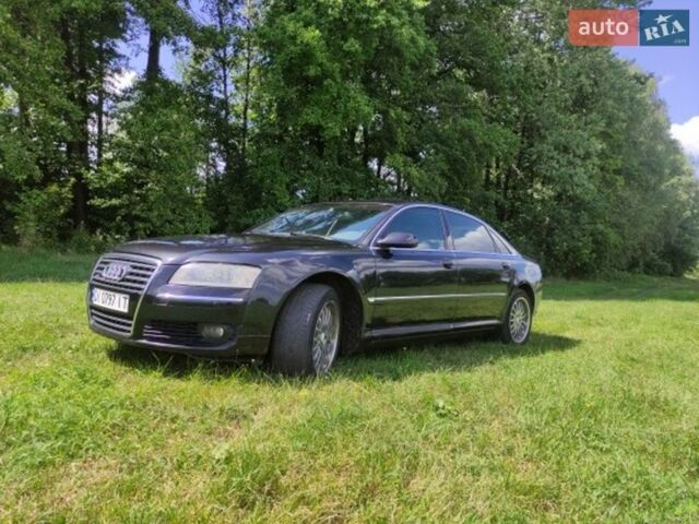 Черный Ауди А8, объемом двигателя 2.98 л и пробегом 295 тыс. км за 8000 $, фото 1 на Automoto.ua