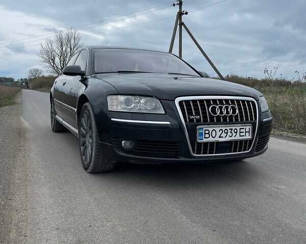 Черный Ауди А8, объемом двигателя 6 л и пробегом 230 тыс. км за 7000 $, фото 1 на Automoto.ua