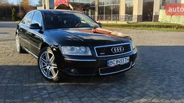 Черный Ауди А8, объемом двигателя 4.2 л и пробегом 326 тыс. км за 5800 $, фото 1 на Automoto.ua