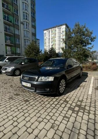 Черный Ауди А8, объемом двигателя 2.98 л и пробегом 363 тыс. км за 7600 $, фото 1 на Automoto.ua