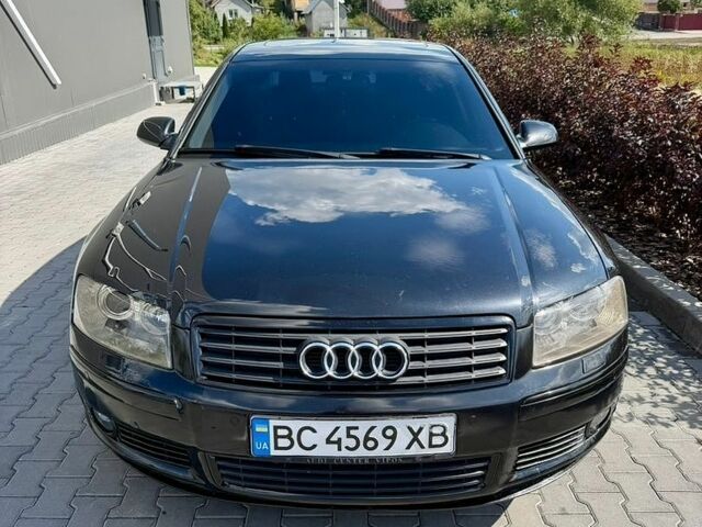 Черный Ауди А8, объемом двигателя 3 л и пробегом 310 тыс. км за 6000 $, фото 1 на Automoto.ua