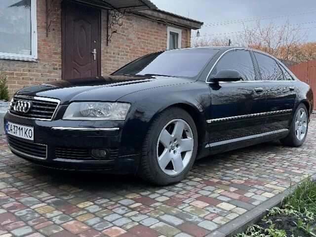 Черный Ауди А8, объемом двигателя 3.9 л и пробегом 337 тыс. км за 7700 $, фото 1 на Automoto.ua
