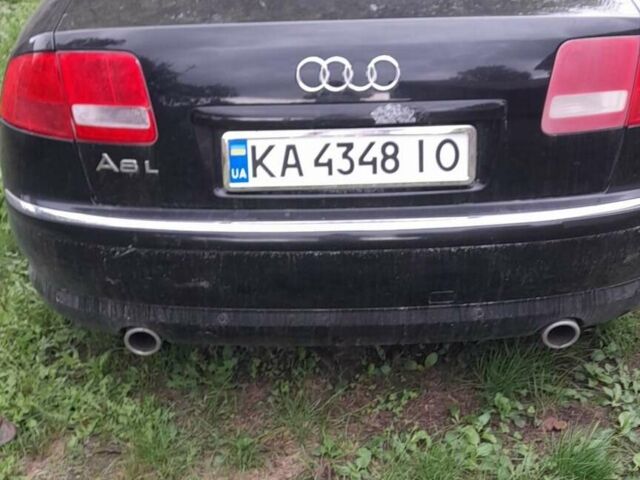 Черный Ауди А8, объемом двигателя 2.98 л и пробегом 260 тыс. км за 2700 $, фото 1 на Automoto.ua