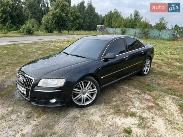 Черный Ауди А8, объемом двигателя 4.2 л и пробегом 365 тыс. км за 9000 $, фото 1 на Automoto.ua