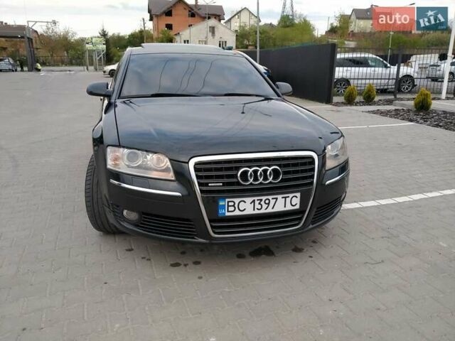 Черный Ауди А8, объемом двигателя 3 л и пробегом 262 тыс. км за 9800 $, фото 1 на Automoto.ua