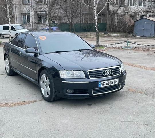 Черный Ауди А8, объемом двигателя 3.99 л и пробегом 265 тыс. км за 7000 $, фото 1 на Automoto.ua
