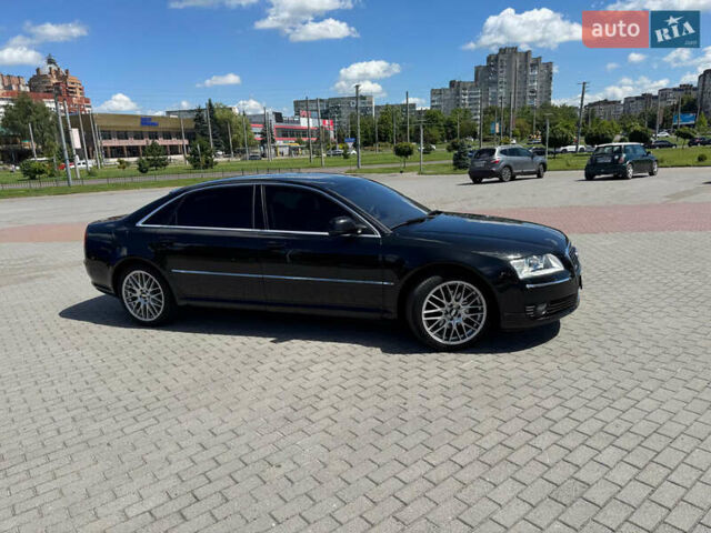 Черный Ауди А8, объемом двигателя 2.98 л и пробегом 309 тыс. км за 8200 $, фото 1 на Automoto.ua