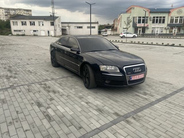 Черный Ауди А8, объемом двигателя 3.7 л и пробегом 260 тыс. км за 7500 $, фото 1 на Automoto.ua