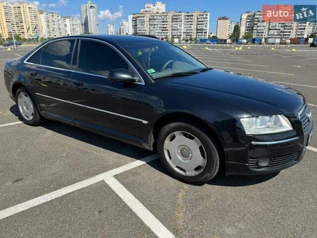 Черный Ауди А8, объемом двигателя 3.7 л и пробегом 279 тыс. км за 9000 $, фото 1 на Automoto.ua