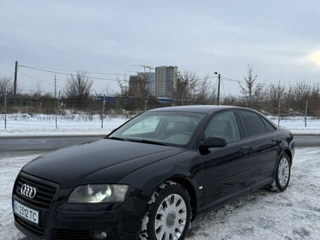 Черный Ауди А8, объемом двигателя 3.7 л и пробегом 299 тыс. км за 5650 $, фото 1 на Automoto.ua