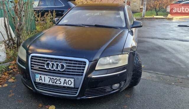 Черный Ауди А8, объемом двигателя 4.16 л и пробегом 325 тыс. км за 5000 $, фото 1 на Automoto.ua