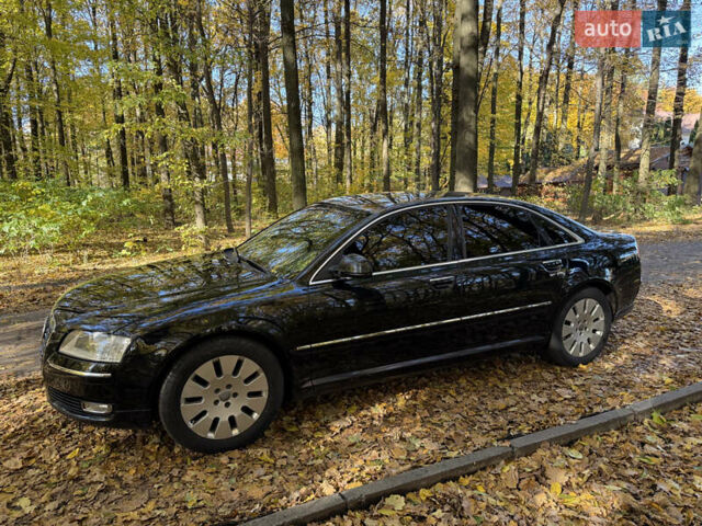 Черный Ауди А8, объемом двигателя 2.97 л и пробегом 304 тыс. км за 10700 $, фото 1 на Automoto.ua