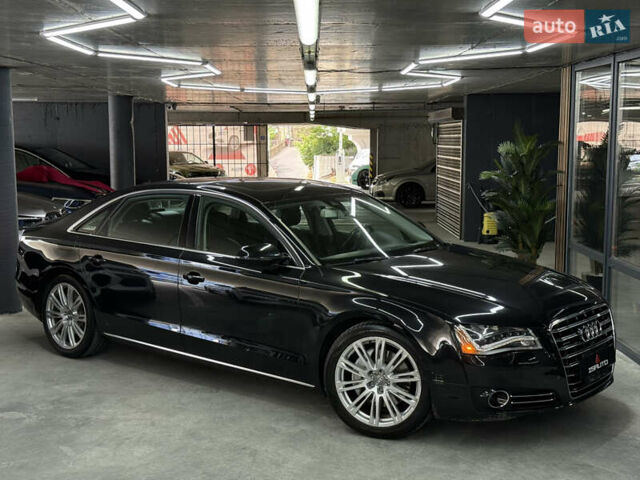 Черный Ауди А8, объемом двигателя 3 л и пробегом 141 тыс. км за 19900 $, фото 1 на Automoto.ua