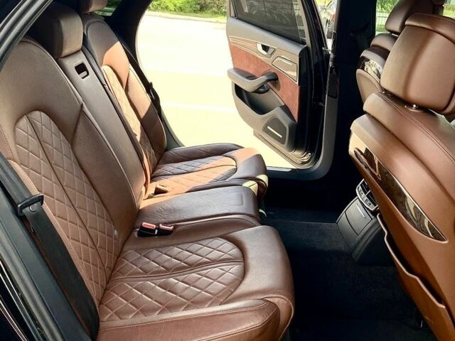 Чорний Ауді A8, об'ємом двигуна 3 л та пробігом 142 тис. км за 18800 $, фото 1 на Automoto.ua