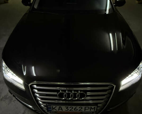 Черный Ауди А8, объемом двигателя 4 л и пробегом 240 тыс. км за 26000 $, фото 1 на Automoto.ua