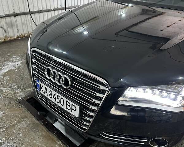 Черный Ауди А8, объемом двигателя 3 л и пробегом 225 тыс. км за 19850 $, фото 1 на Automoto.ua
