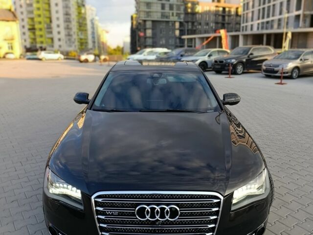 Черный Ауди А8, объемом двигателя 6 л и пробегом 260 тыс. км за 20000 $, фото 1 на Automoto.ua