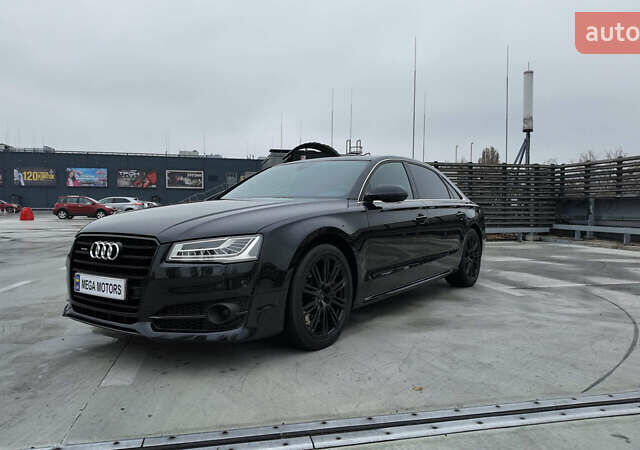 Черный Ауди А8, объемом двигателя 3 л и пробегом 213 тыс. км за 16990 $, фото 1 на Automoto.ua