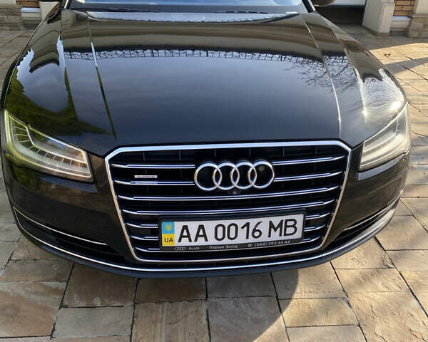Черный Ауди А8, объемом двигателя 3.99 л и пробегом 145 тыс. км за 28000 $, фото 1 на Automoto.ua