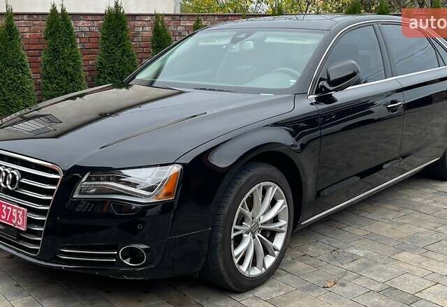 Черный Ауди А8, объемом двигателя 3 л и пробегом 318 тыс. км за 23700 $, фото 1 на Automoto.ua
