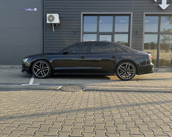 Черный Ауди А8, объемом двигателя 3.99 л и пробегом 187 тыс. км за 33000 $, фото 1 на Automoto.ua