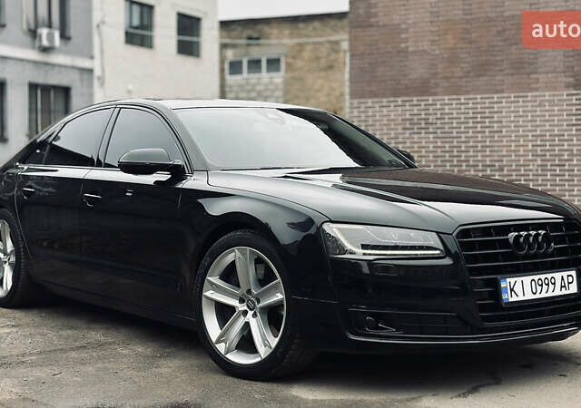 Черный Ауди А8, объемом двигателя 3 л и пробегом 189 тыс. км за 19300 $, фото 1 на Automoto.ua