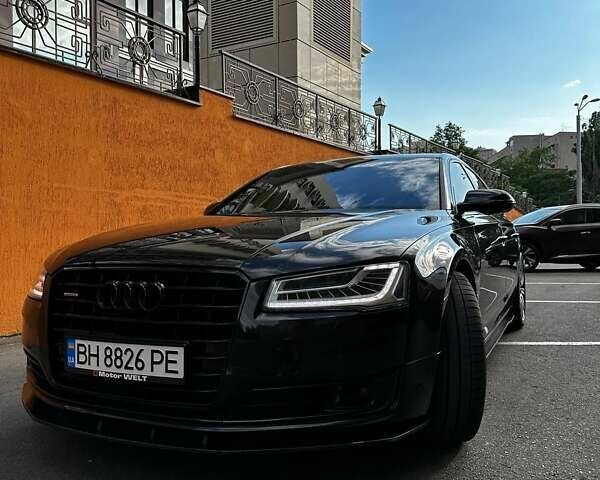 Черный Ауди А8, объемом двигателя 3.99 л и пробегом 224 тыс. км за 28200 $, фото 1 на Automoto.ua