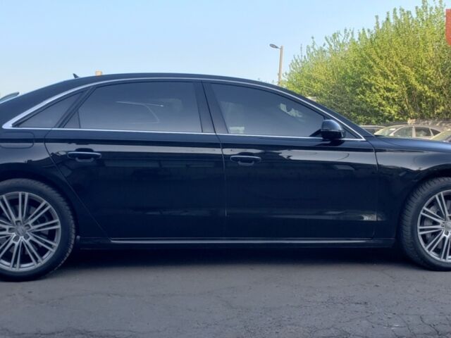Чорний Ауді A8, об'ємом двигуна 3 л та пробігом 135 тис. км за 24999 $, фото 1 на Automoto.ua