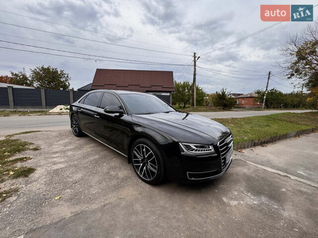 Черный Ауди А8, объемом двигателя 2.97 л и пробегом 206 тыс. км за 32000 $, фото 1 на Automoto.ua