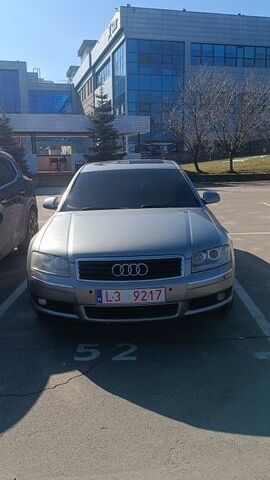 Серый Ауди А8, объемом двигателя 4 л и пробегом 370 тыс. км за 5100 $, фото 1 на Automoto.ua