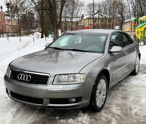Серый Ауди А8, объемом двигателя 3 л и пробегом 375 тыс. км за 4900 $, фото 1 на Automoto.ua