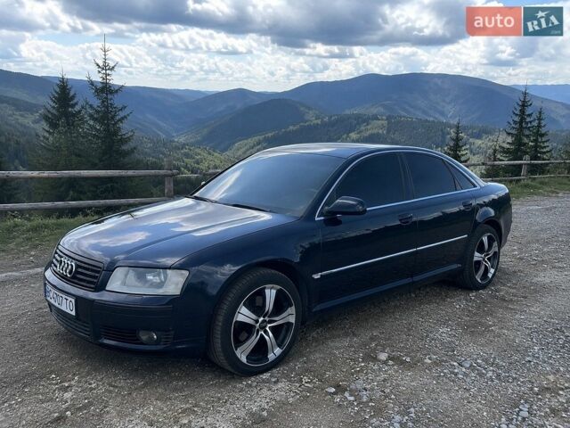 Синий Ауди А8, объемом двигателя 2.97 л и пробегом 392 тыс. км за 8800 $, фото 1 на Automoto.ua