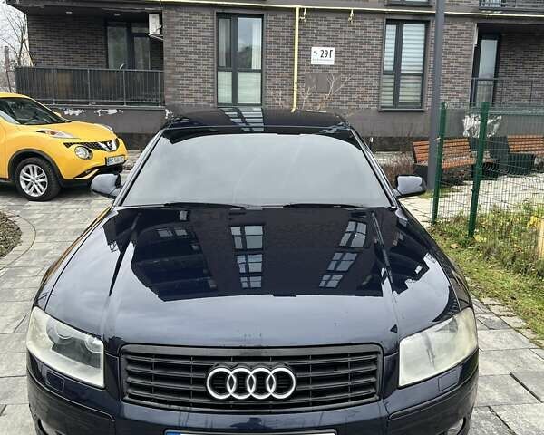 Синий Ауди А8, объемом двигателя 2.97 л и пробегом 386 тыс. км за 8700 $, фото 1 на Automoto.ua