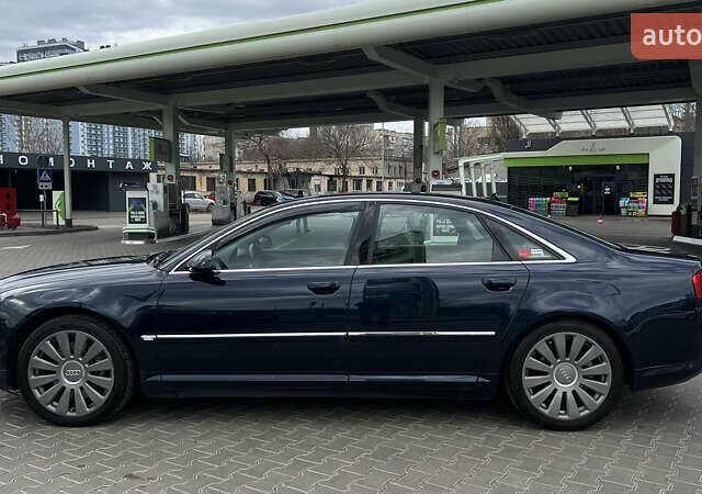 Синий Ауди А8, объемом двигателя 4 л и пробегом 261 тыс. км за 7300 $, фото 1 на Automoto.ua