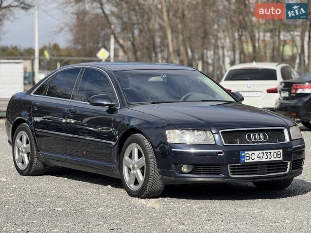 Синий Ауди А8, объемом двигателя 4 л и пробегом 453 тыс. км за 7300 $, фото 1 на Automoto.ua