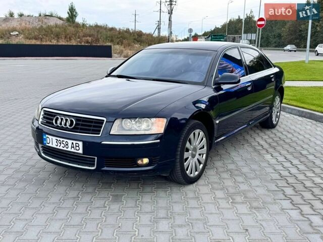 Синий Ауди А8, объемом двигателя 4.2 л и пробегом 221 тыс. км за 5600 $, фото 1 на Automoto.ua