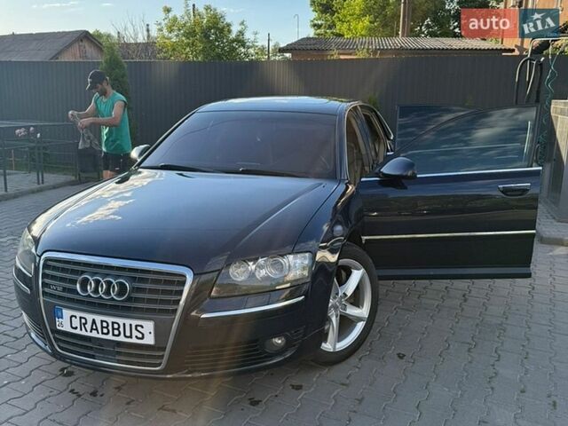 Синий Ауди А8, объемом двигателя 4.2 л и пробегом 230 тыс. км за 12000 $, фото 1 на Automoto.ua