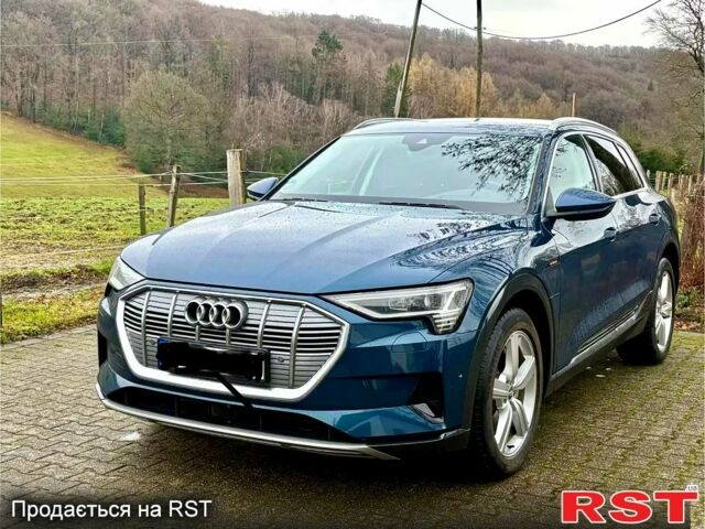 Синій Ауді E-Tron, об'ємом двигуна 0.41 л та пробігом 83 тис. км за 33480 $, фото 1 на Automoto.ua