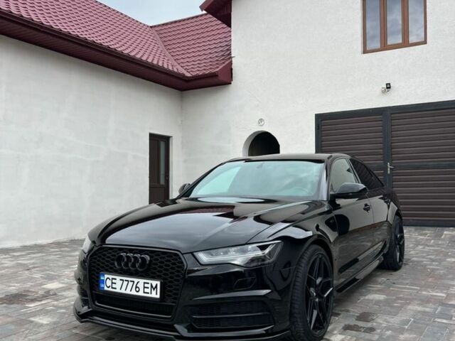 Чорний Ауді С6, об'ємом двигуна 4 л та пробігом 158 тис. км за 36070 $, фото 1 на Automoto.ua
