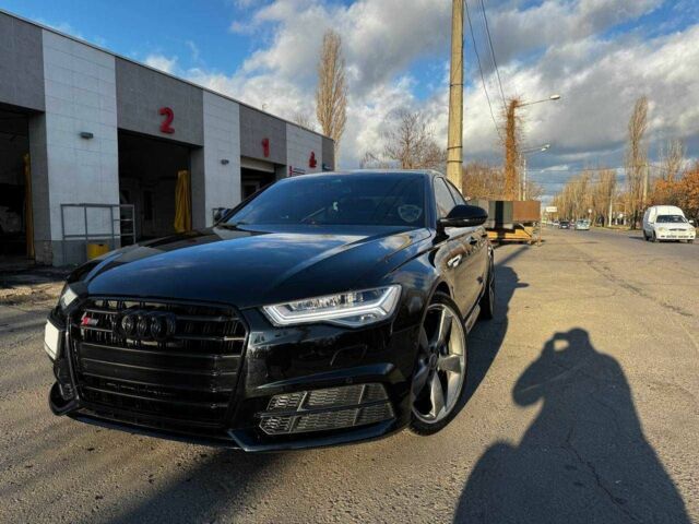 Черный Ауди С6, объемом двигателя 4 л и пробегом 128 тыс. км за 29500 $, фото 1 на Automoto.ua