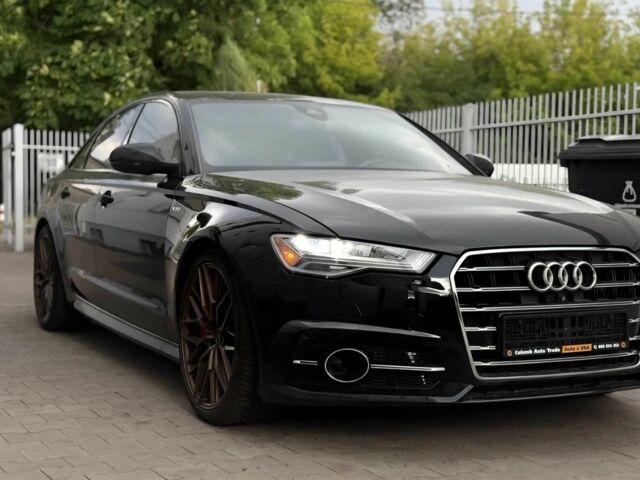 Черный Ауди С6, объемом двигателя 4 л и пробегом 130 тыс. км за 34000 $, фото 1 на Automoto.ua