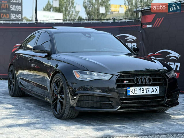 Черный Ауди С6, объемом двигателя 4 л и пробегом 180 тыс. км за 26000 $, фото 1 на Automoto.ua
