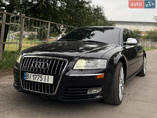 Черный Ауди С8, объемом двигателя 5.2 л и пробегом 330 тыс. км за 13000 $, фото 1 на Automoto.ua