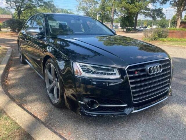 Черный Ауди С8, объемом двигателя 4 л и пробегом 57 тыс. км за 4100 $, фото 1 на Automoto.ua